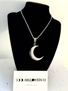 Half Moon Metal Necklace For Gift, Half Moon Metal Necklace For Gifts, Silver Crescent Moon Phase Charm Necklace, Nickel Free Half Moon Silver Necklace, Nickel-free Silver Half Moon Necklace, Nickel-free Silver Half-moon Necklace, Silver Half Moon Charm Necklaces, Silver Half Moon Charm Necklace, Silver Crescent Moon Phase Necklace