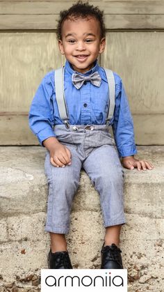 Little boy wearing a blue shirt, jeans, light grey suspenders and a bow tie Suspenders And Bow Tie, Grey Suspenders, Tie And Suspenders, Polka Dot Bow Tie