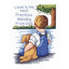 a cross stitch pattern with a boy holding a dog and saying love is the most precious blessing