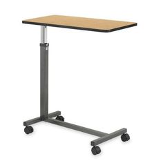 a table with wheels and a wooden top on an isolated white background for use as a stand up desk