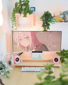 a desktop computer sitting on top of a wooden desk