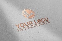 a logo for a photo - realistic mockup company is shown in this close up shot