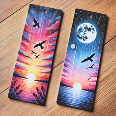 two bookmarks with birds flying in the night sky