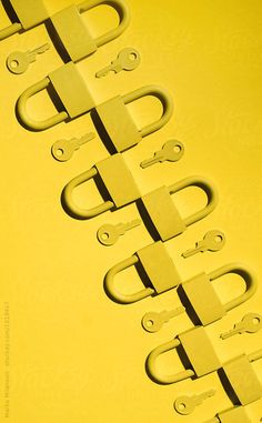 several pairs of scissors are arranged in a row on a yellow background by luma studio for stocks & bond