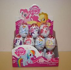 an assortment of little pony eggs in a box