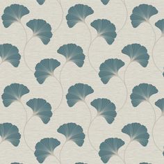 a blue and white wallpaper with large leaf shapes on it's back ground