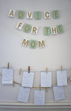 the advice for the mom hanging from clothes pins on a string with pegs attached to it