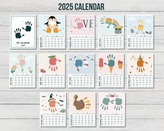 a calendar with handprinted animals on it