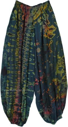 These harem-style pants feature a distinctive tie-dye pattern, combining deep greens, teal blues, and hints of red and yellow for a vibrant look.  Made from soft, breathable rayon, these pants offer a relaxed and comfortable fit, perfect for casual wear. #tlb #SplitSkirtsPants #TieDye #bohemianfashion #hippieloungepants Green Bohemian Harem Pants With Loosely Fitted Hips, Bohemian Green Harem Pants With Loose Fit, Green Bohemian Harem Pants, Green Harem Bottoms For Festival, Green Harem Pants For Festival, Green Festival Pants For Spring, Spring Festival Green Pants, Tie Dye Harem Pants, Green Clothing