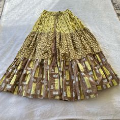 Yvonne S. Multi Print Double Maxi Cotton Voile Skirt - Rare Print Size: Xs Color: Yellow, Brown, Gold Threading Condition: Veuc! - Gold Stitching + Hanging Threads Mostly On Both Raw Hem Lines - Cord Tassel Belt With Gold Threading - Exposed Gold Threads - Elastic Waist - Unlined But Not Sheer Due To Thickness Of Fabric - 100% Cotton Voile - Using Original Techniques No Two Are Alike Therefore Making Each Piece Unique * Stock Photo Is Not The Skirt Print That’s For Sale. It’s Being Used To Only Show Fit * - See Photos For Measurements! Tassel Belt, Gold Threads, Cotton Voile, Yellow And Brown, Elastic Waist, Maxi Skirt, Womens Skirt, Yellow, Women Shopping