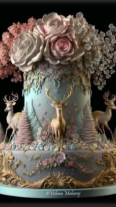 an elaborately decorated cake with flowers and deer