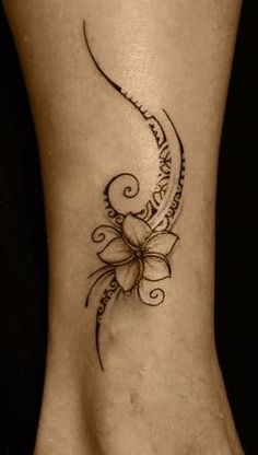 a woman's foot with a tattoo on it