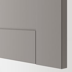 a gray cabinet with two doors on each side