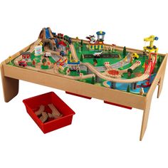 a child's wooden train table and red container