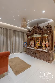 a living room filled with furniture and a chandelier