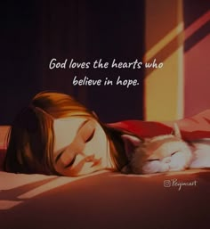 a woman laying in bed next to a cat with a quote on the side that says, god loves the hearts who believe in hope