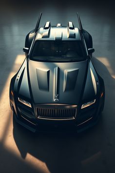 the front end of a black sports car