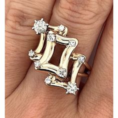 This Vintage Modernist Ring Is A Unique Piece Of Jewelry That Features Natural Diamonds In A Geometric Design. Crafted From 14k Solid Yellow Gold, This Ring Has A Prong Setting Style And A Round Main Stone Shape In White/Colorless. The Brand Is Ac-M And The Ring Size Is 7, Perfect For Anyone Who Loves Nature-Themed Jewelry. This Ring Falls Under The Category Of Vintage And Antique Jewelry In The Rings Section Of The Jewelry & Watches Category On Ebay. Biggest Diamond 3.8mm Smallest Diamond 1.5mm Size 7 10 Diamonds Modernist Ring 5.55 Grand Antique Jewelry Rings, Fall Rings, Modernist Ring, Big Diamond, Natural Diamond Ring, Themed Jewelry, Nature Themed, Vintage Ring, The Rings