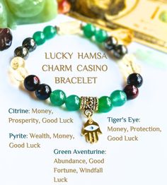 Introducing our lucky casino bracelet featuring a Lucky Hamsa Charm. The Hamsa charm is a popular Middle Eastern symbol of protection and good luck. This  bracelet is made of Citrine, Pyrite, Green Aventurine, and Tiger's Eye. which are known for their ability to attract money, prosperity, abundance and good luck. The lucky Hamsa charm adds an extra touch of good fortune to this already powerful bracelet. Wear it to the Casino or any other place where you hope to win big. It is perfect for anyone who wants to feel protected, lucky and blessed.  Feel the power of the hamsa working for you as you play your favorite games. Watch your luck change as you wear this bracelet. Don't wait  to start attracting good fortune into your life - order your bracelet now before it runs out! MATERIALS: 8mm G Lucky Bracelet Good Luck, Spiritual Good Luck Charm Bracelet, Spiritual Good Luck Jewelry Bracelet, Symbolic Good Luck Bracelets With Round Beads, Crystals For Wealth, Goodluck Charms, Lucky Money, Good Luck Spells, Hamsa Charm