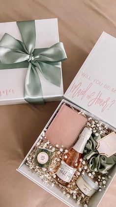 two gift boxes with different items in them