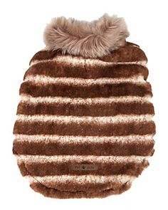 a brown and white striped hat with a fur pom