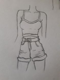 a drawing of a woman's shirt and shorts on a piece of white paper