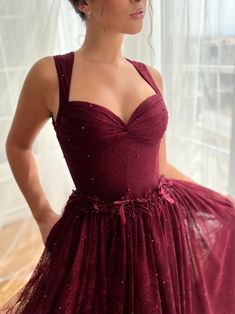 Elevate your evening look with this captivating burgundy midi dress, featuring a sweetheart neckline and a structured bodice adorned with delicate pleating. The intricate lace fabric, enhanced with subtle beadwork, flows into a gracefully A-line skirt, while the embellished waist adds a touch of elegance. Perfect for galas and special occasions, this dress exudes sophistication from every angle. Maroon Corset Dress, Burgundy Corset Dress, Maroon Prom Dresses, Maroon Corset, Maroon Prom Dress, Short Sleeve Prom Dresses, Burgundy Midi Dress, Sweetheart Neckline Dress, Prom Dress Ideas