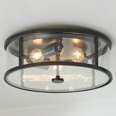 a ceiling light with three lights on it