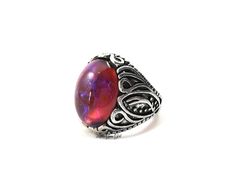 "This ring is exquisite! The focal point of this ornate filigree Victorian style ring is the 13x18mm Glass Cabochon which has been made in the style of a Mexican Opal also known as Dragon's Breath (made from glass not a gemstone). With each slight turn, the colors shift from deep scarlet red to lightening strikes of blues! Mexican Opal, also known as Dragon's Breath, is a collector's nickname for man-made stones that are made of glass and mixed with certain metals to produce a brilliant color sh Mexican Fire Opal Ring, Victorian Style Rings, Jelly Opal, Mexican Opal, Mexican Fire Opal, Dragons Breath, Fire Opal Ring, Filigree Ring, Opal Ring