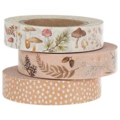 three rolls of washi tape with mushrooms and leaves on them