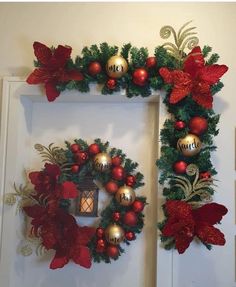 two christmas wreaths hanging on the front door with red and gold ornaments around them