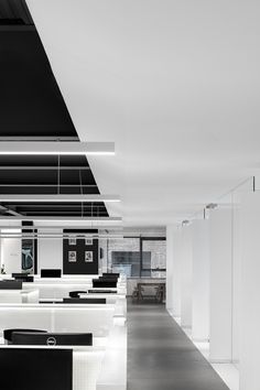 an empty office with black and white decor