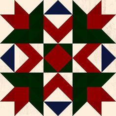 an image of a quilt pattern with red, green and blue squares on it's sides