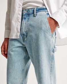 Our on-trend loose jeans that are relaxed and loose-fitting through the hip and thigh in our 100% cotton no-stretch fabric and broken-in denim feel. Features a light wash, painter-style utility details and a clean hem. Straight Leg Flare Jeans For Elevated Casual Look, Medium Wash Cropped Jeans With Relaxed Fit And Pockets, Urban Cotton Jeans For Elevated Casual Occasions, Urban Cotton Jeans, Everyday Medium Wash Tapered Bottoms, Everyday Medium Wash Cargo Jeans, Mid-rise Rigid Denim Cargo Jeans, Utility Wide Leg Recycled Denim Jeans, Utility Wide-leg Recycled Denim Jeans