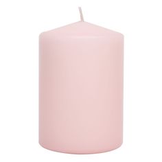 a pink pillar candle with a white background