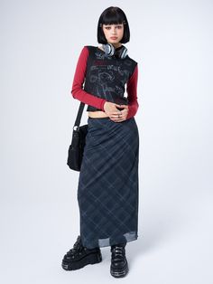 Add to your maxi skirt collection with our Erika Black Checked Mesh Maxi Skirt, perfect for layering with grunge tops, oversized sweaters, and Minga jackets. Buy Now Pay Later options available and 15% off for students.