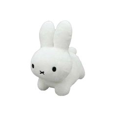 a white stuffed animal with black eyes on it's face and ears, sitting in front of a white background