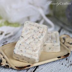 two pieces of soap sitting on top of a plate