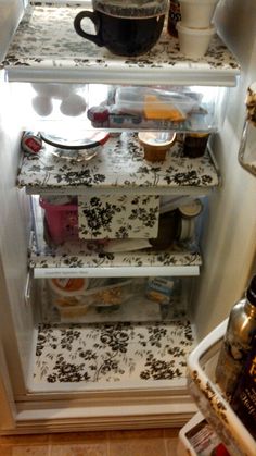 an open refrigerator filled with food and drinks