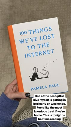 a person holding up a book in front of their face and the caption reads, 10 things we've lost to the internet