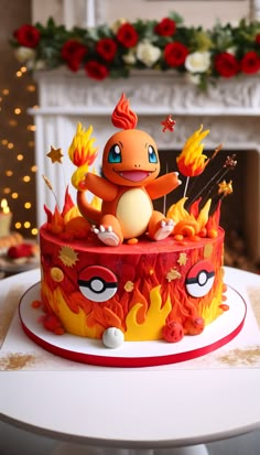 a birthday cake decorated with an image of a pikachu sitting on top of a fire