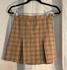 High waisted 90s/Y2K pleated plaid mini skirt. Partial elastic waist in the back.  Marked as a girls Large 14/16. Measurements laid flat:  12" waist  15.5" length of skirt  16" hip Open to offers! My mannequin's measurements are: Height: 69" (5'9") Chest: 32" Waist: 24" Hip: 34" All measurements of items listed are approximate, and are taken as accurately as I can to the best of my ability. Please note that with vintage items, there may be signs of wear and small imperfections. When possible, we will show imperfections and the price will reflect these. I make every effort to describe items as accurately as possible, however, sometimes something small may be unintentionally overlooked. Please read the item listing in its entirety & look at all pictures closely. If you're not completely happ Hip Openers, Kansas City Mo, Plaid Mini Skirt, Pleated Mini Skirt, Kansas City, Favorite Outfit, Mini Skirt, Elastic Waist, Art Collection