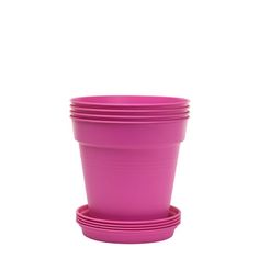 pink plastic cups stacked on top of each other in front of a white background,