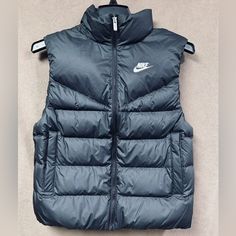 Brand New With Tag 100% Authentic Functional Sports Vest For Winter, Functional Winter Sports Vest, Black Sporty Puffer Vest, Black Athleisure Puffer Jacket For Winter, Black Winter Athleisure Puffer Jacket, Black Sportswear Vest For Streetwear, Sporty Winter Vest With Pockets, Nike Outerwear For Winter Sports With Pockets, Sports Puffer Jacket With Pockets