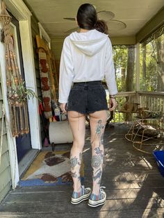 "I wish I could pull these off! Best faded black 90's high waisted black denim shorts. Frayed hem and cheeky bottom. Waist: 24\" Hips: 34\" Rise: 12\" Model is 5'7\" and 115 lbs with measurements of 30x23x33. Buy with confidence as all outside photos are taken in natural lighting" All Black Shorts Outfit, Black Denim Vest, 115 Lbs, Black Jean Shorts, Black Jean, Cutoff Shorts, Black High Waist, Natural Lighting, Leather Vest