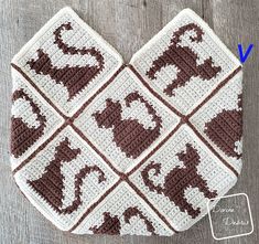 a crocheted square with an elephant on it