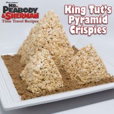 three pieces of rice krispy treats on a plate with the title king tut's pyramid crispies