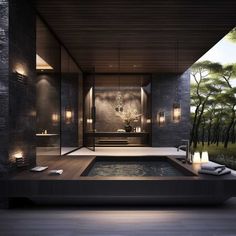 a spa room with a large jacuzzi tub and candles on the table next to it