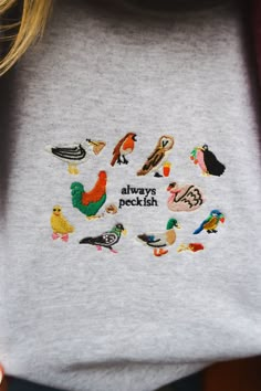 Birds & snacks ❤️🦆 ☺ 50% cotton & 50% polyester blend, with a cosy, fleece lining inside. ✐ Dreamed up, hand drawn, designed & embroidered in the UK. ✿ Hand wash if possible. Or machine wash, inside out, at 30°c. ♥ Everything is uni-sex sizing, yay! Please take a look at our size guide for more details (it's just next to the product title). ☻ Sade is a UK size 8 & wears a size L navy sweatshirt ☻ Luena is a UK size 14 & wears a size XL pastel green sweatshirt ☻ Amelia is a UK size 12 & wears a Machine Embroidered Gifts Ideas, Embroidered Gifts Ideas, Embroidered Sweatshirt Ideas, Embroided Sweatshirt, Embroidered Sweatshirt Diy, Happy Embroidery, W Pictures, Cool Sweatshirts, Navy Sweatshirt