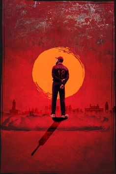 a man standing on top of a skateboard in front of a red sunset with the sun behind him